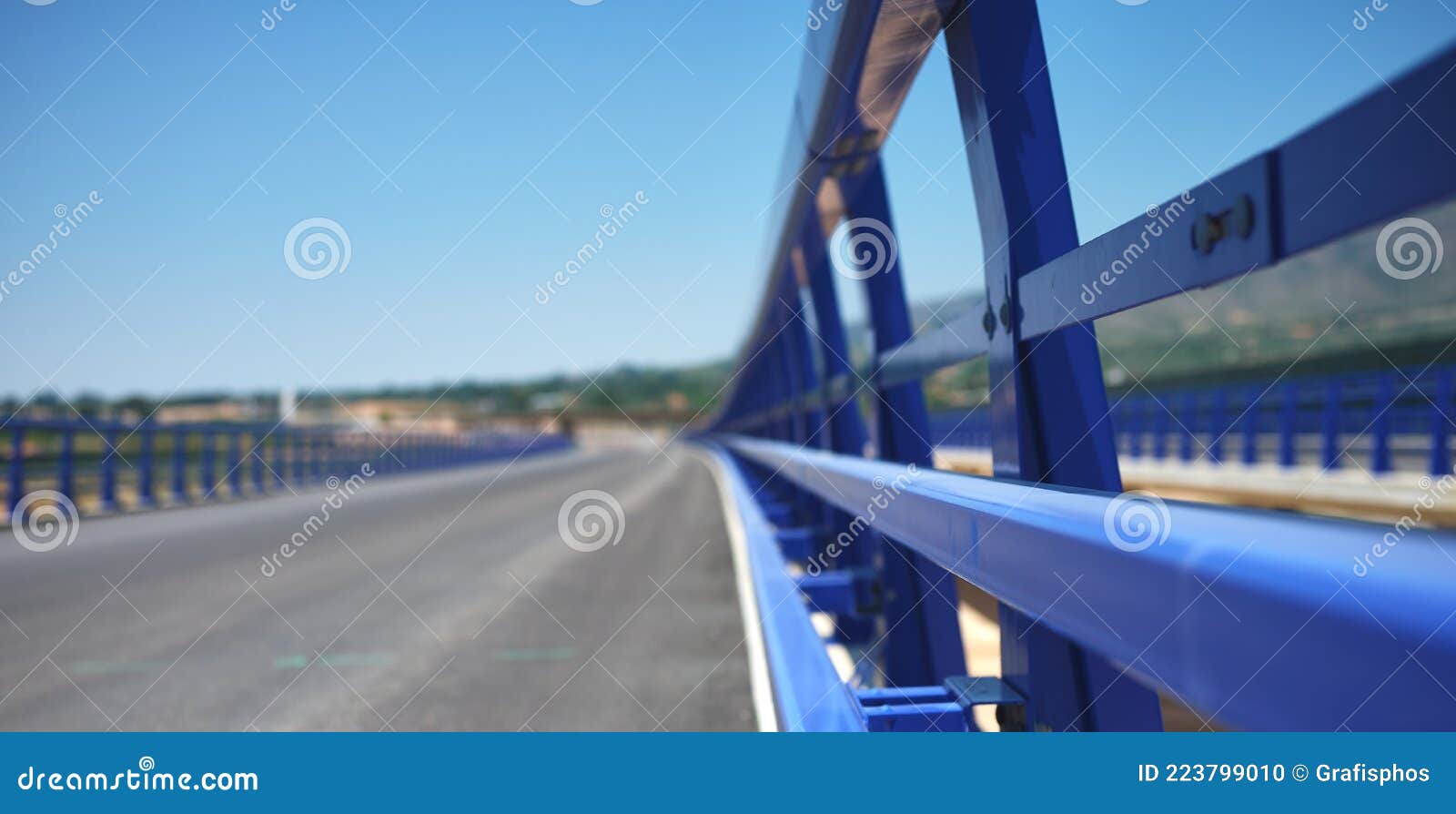 Blue Rail Guard on a Stretch of Highway Under Construction Stock Photo