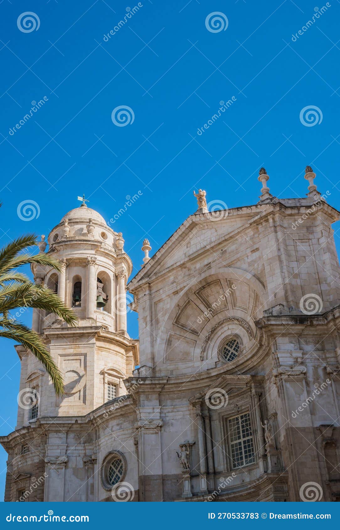 detail of the cathedral of la santa cruz of cÃ¡diz with bell tower and concave  above, spain
