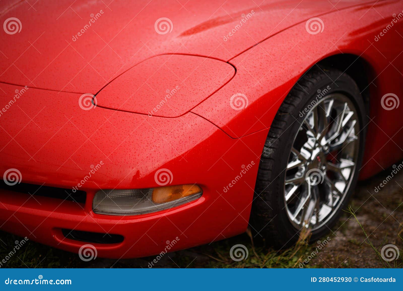 detail of a closed headlight on a 2000 chevrolet corvette