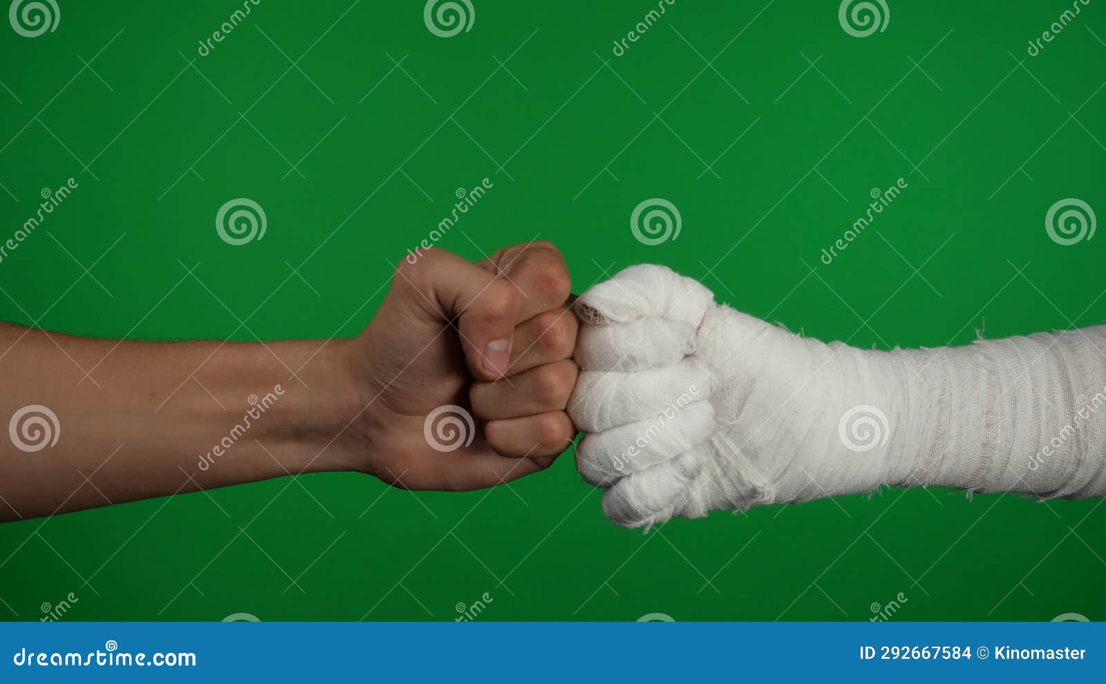 detail green screen  chroma key photo capturing the mummy's hand reaching for the human hand, friendly