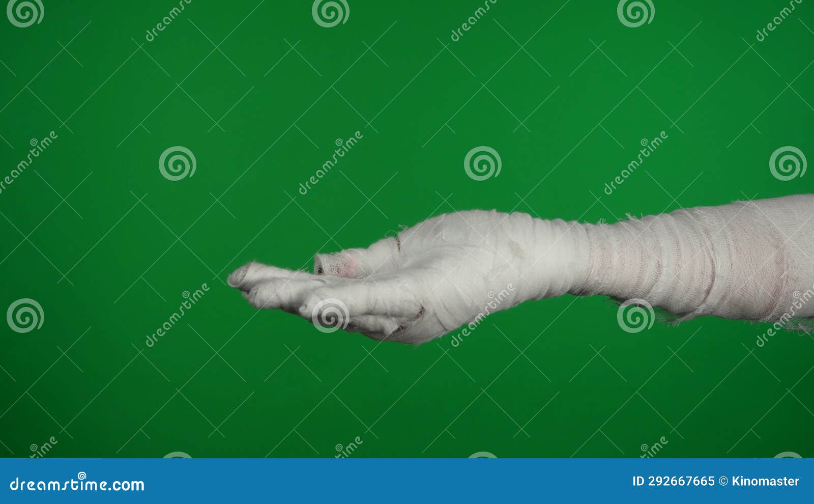 detail green screen  chroma key photo capturing mummy's hand showing in the frame, reaching and asking for
