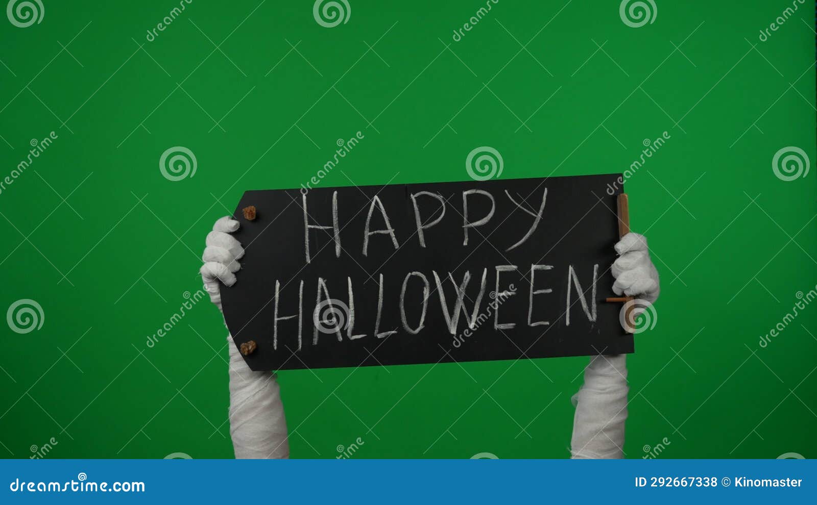 detail green screen  chroma key photo capturing mummy's hands holding a black chalkboard with 'happy