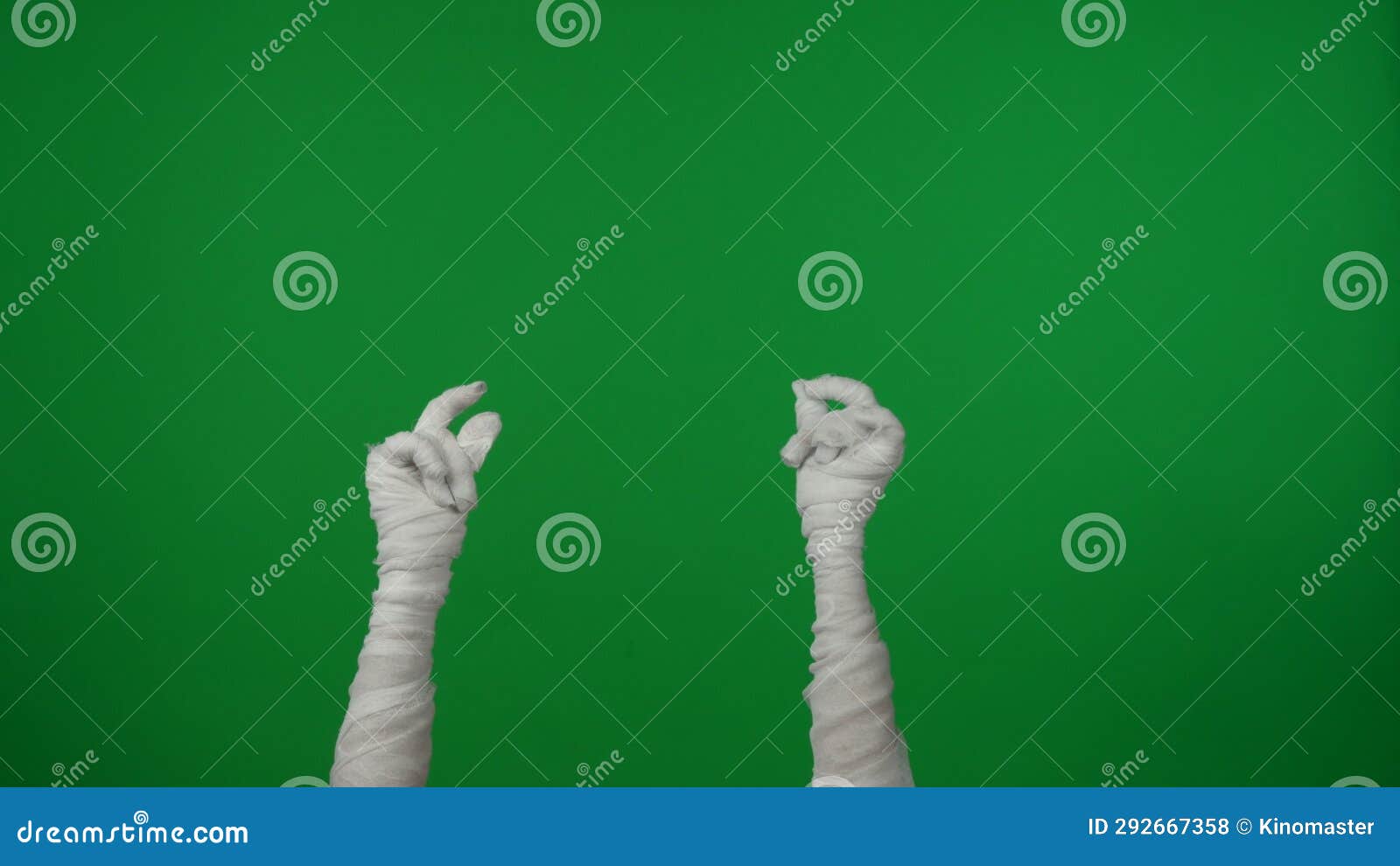 detail green screen  chroma key photo capturing mummy's hands raising up in the air, snapping its fingers.