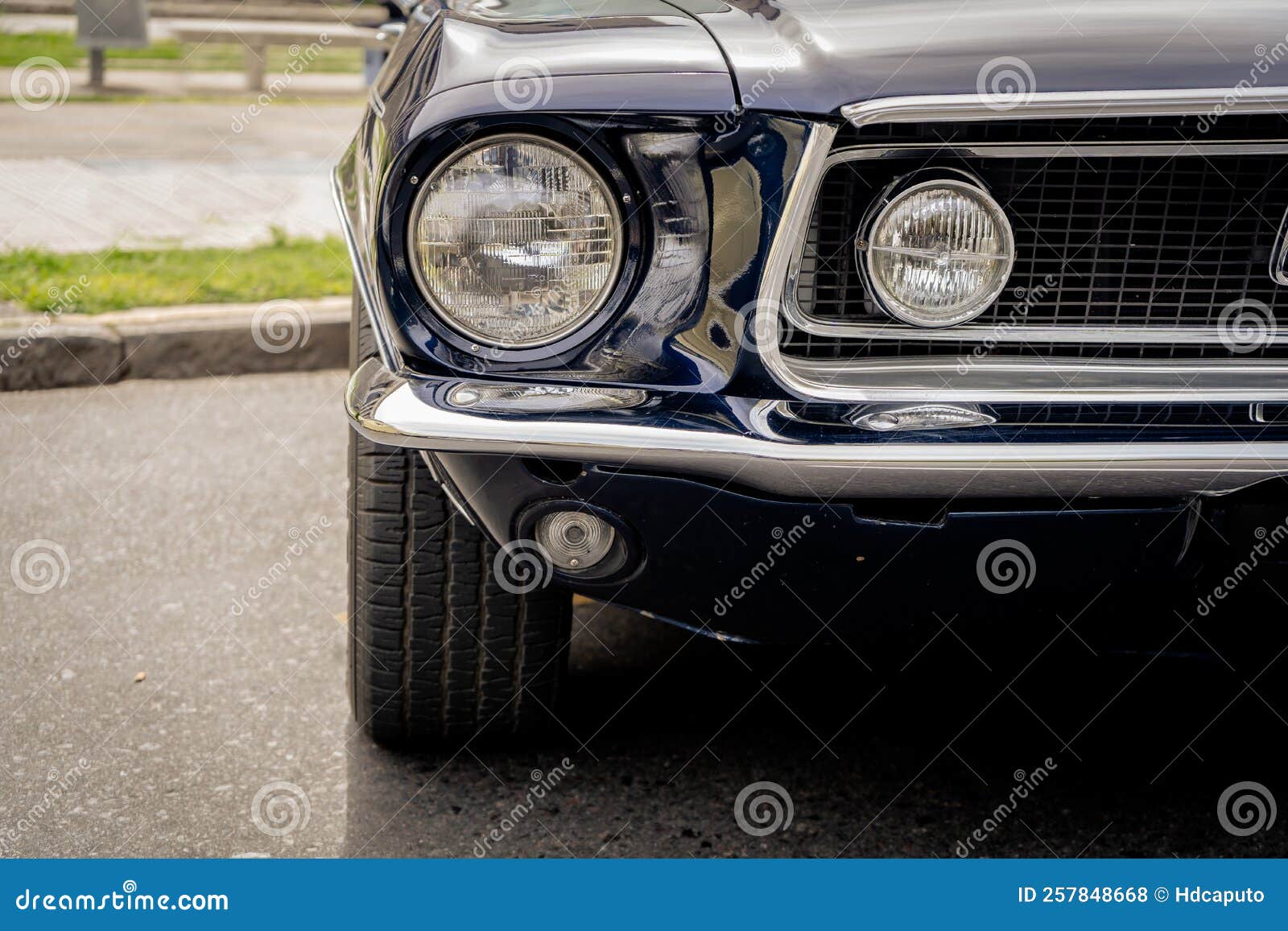 Detail of the Headlight or Front Left Light of a Retro Collector`s Car