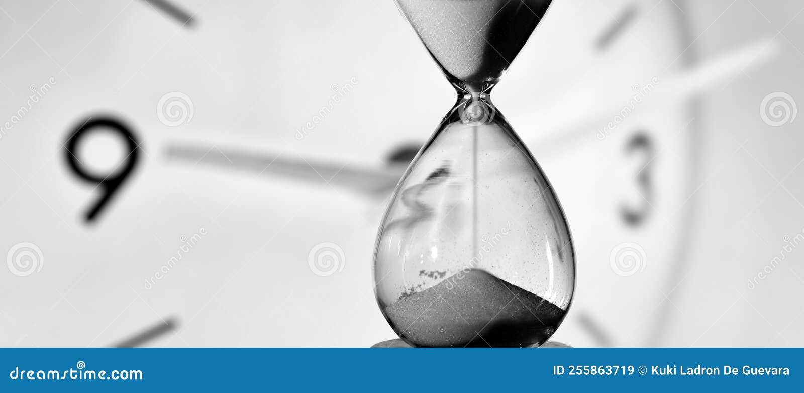 hourglass and round clock measuring time