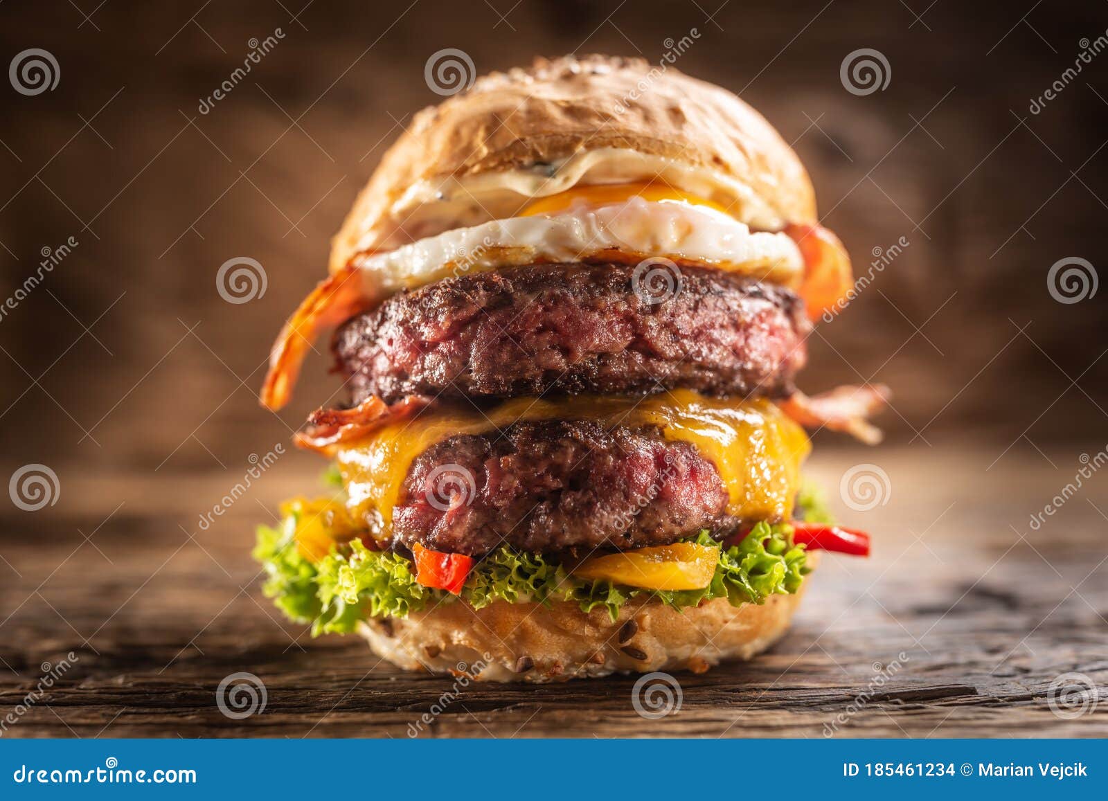 Detail of a Massive Double Beef Burger with Fried Egg, Cheese, Bacon
