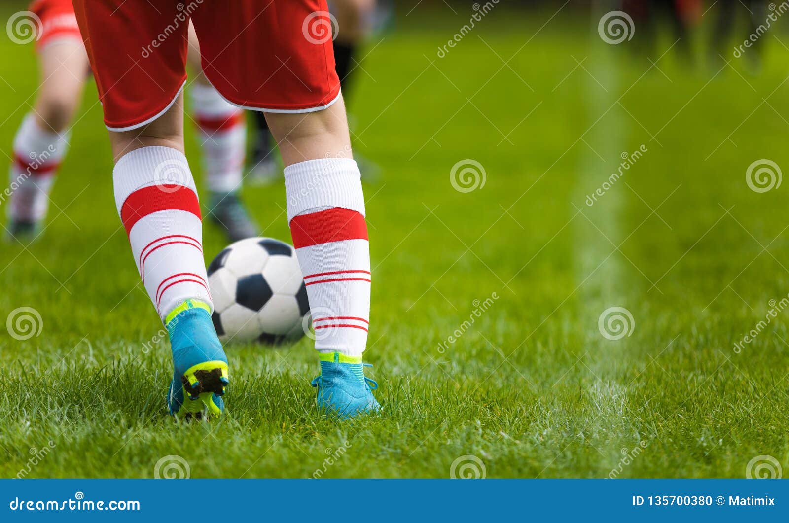 Detail Soccer Background Close Up Legs And Feet Of Football Player In White Socks And Blue Cleats Playing Game On Green Grass Stock Photo Image Of Kids Goal