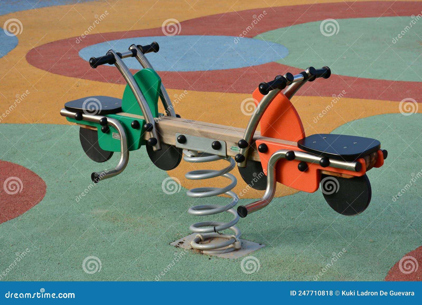 detail of some of the swings for children in a playground