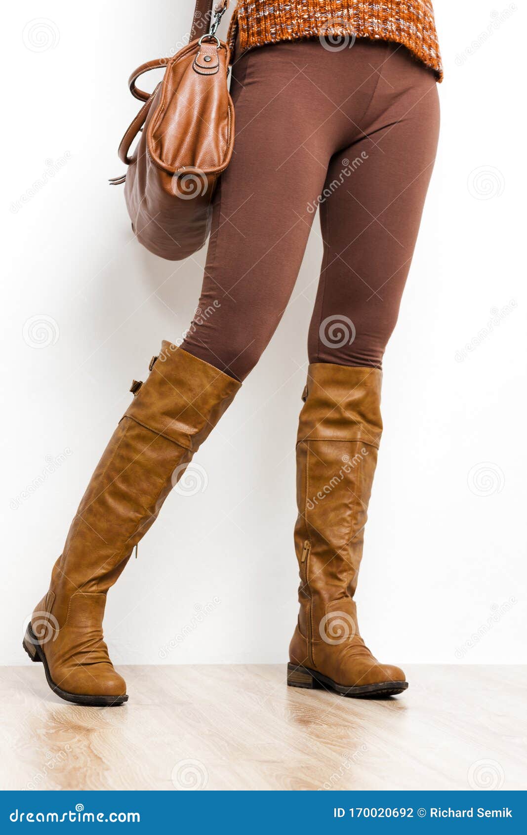 Detail of Standing Woman Wearing Brown Boots with a Handbag Stock Photo ...