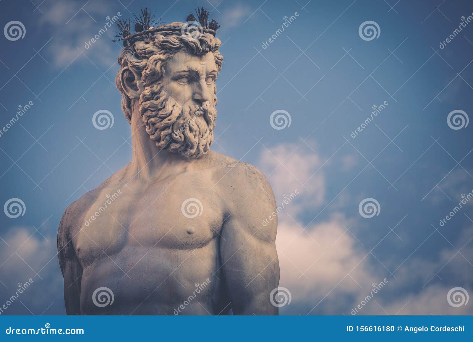 detail of the statue of the fountain of neptune fontana del nettuno on the piazza della signoria in florence, italy.