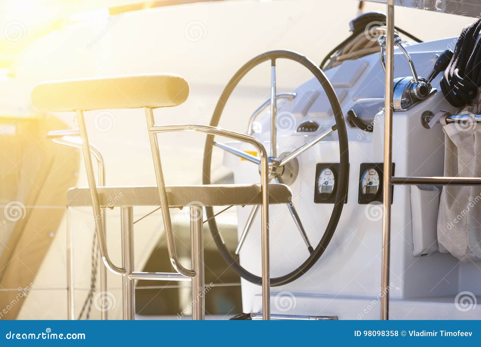 Detail of Steering Wheel and Navigation Instruments of a Sailboat. Blur