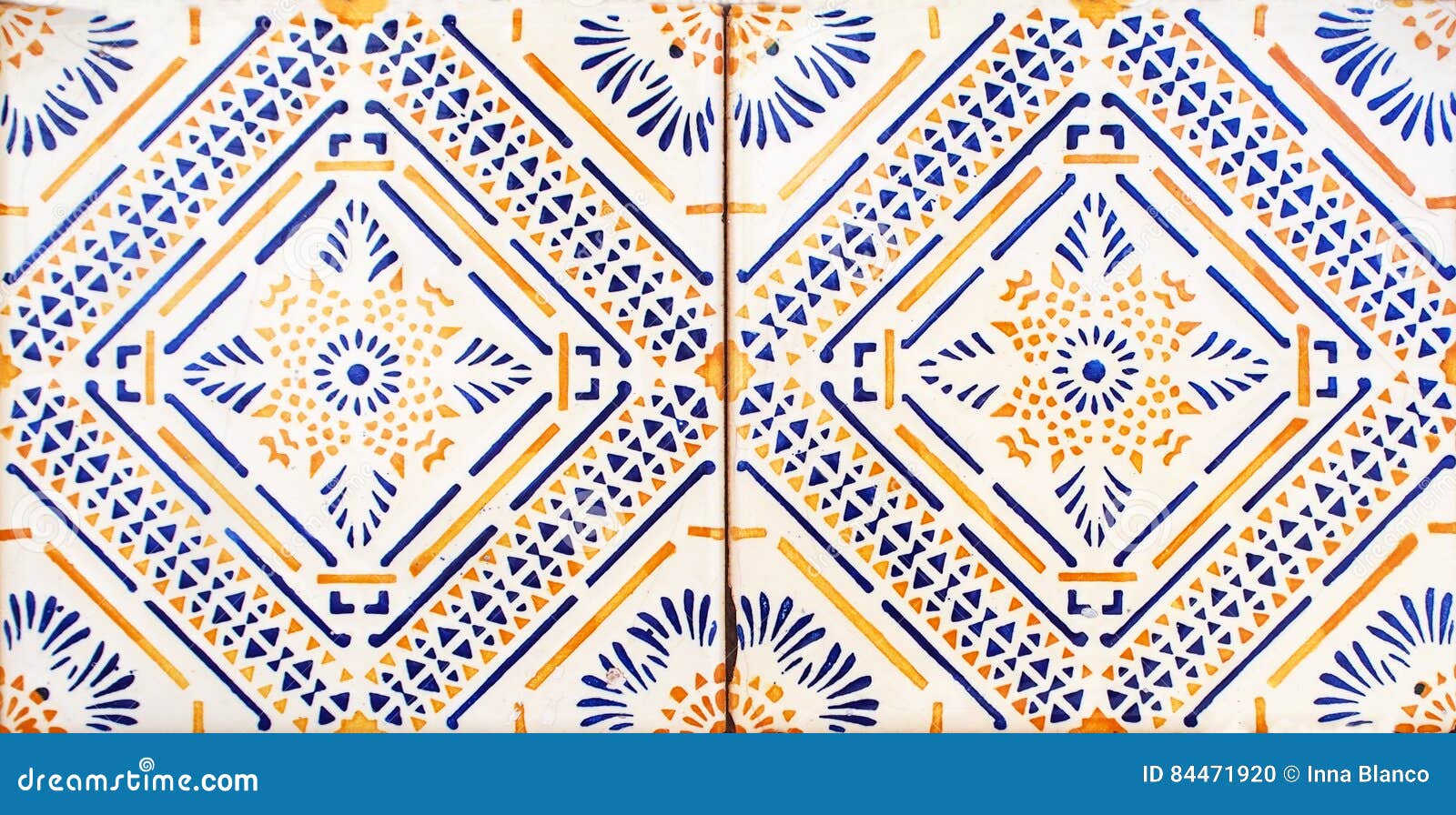 detail of the traditional tiles from facade of old house. decorative tiles.valencian traditional tiles. floral ornament. majolica,