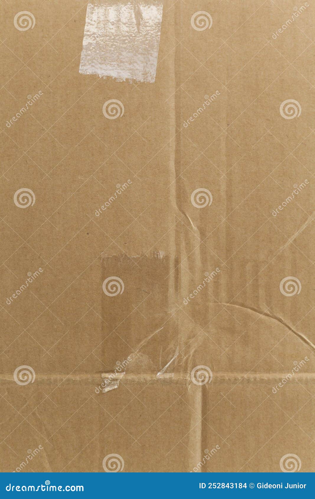 detail of an unwritten cardboard box.