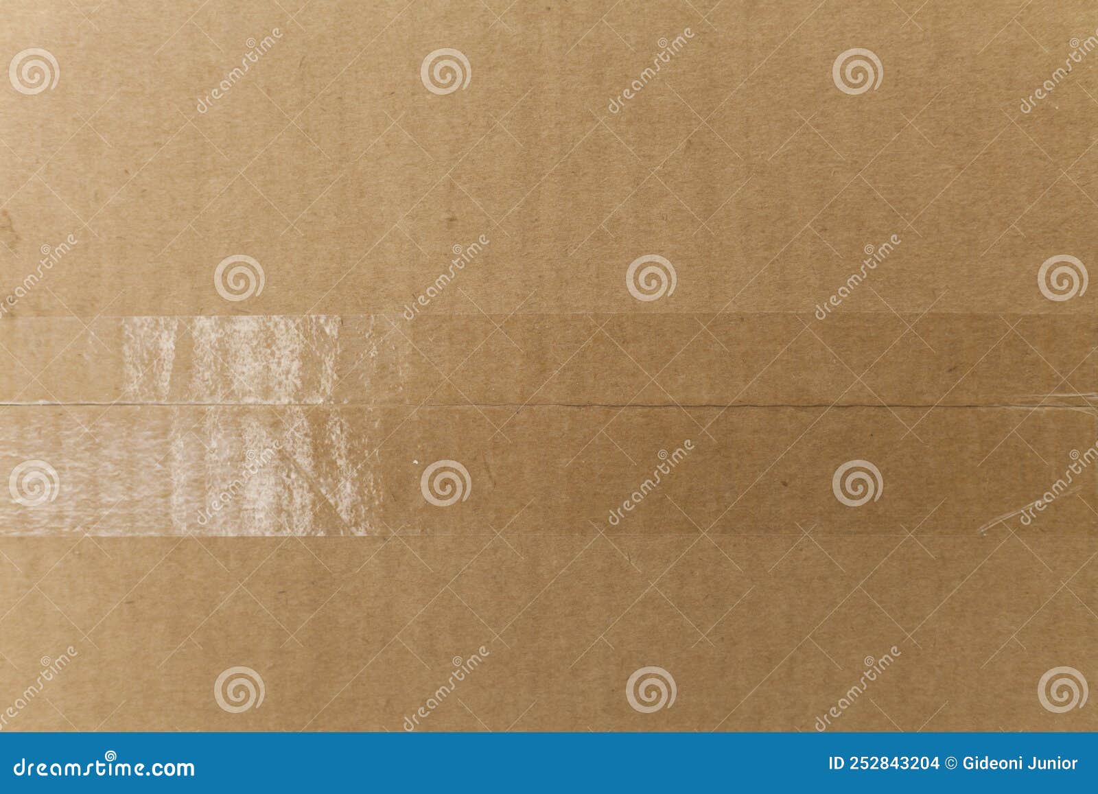 detail of an unwritten cardboard box.