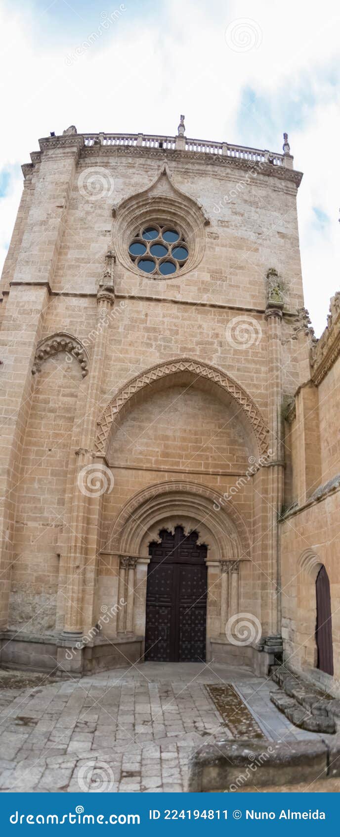 detailed lateral facade view at the iconic spanish romanesque architecture building at the cuidad rodrigo cathedral, downtown city