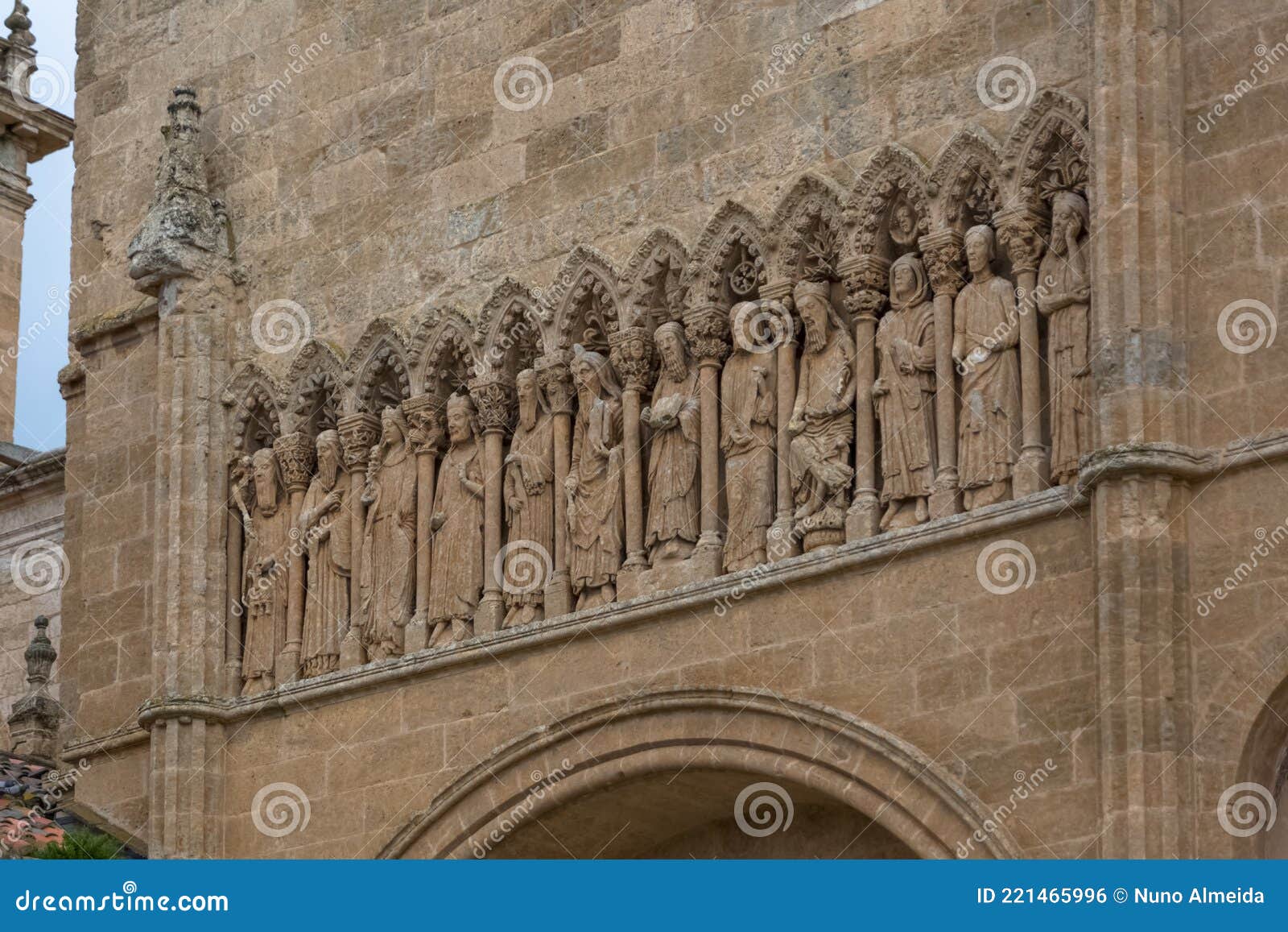 detailed view of a amazing romanesque sculpture on the chain gate, cuidad rodrigo cathedral facade, with old testament