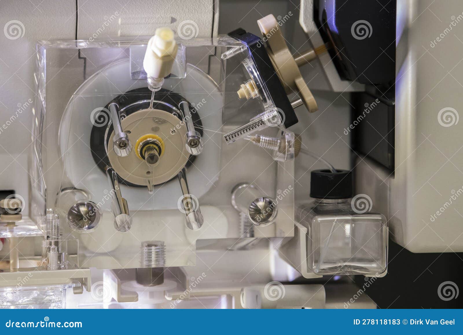detailed view of a transparant polymer pump on a sanger genetic analyser.