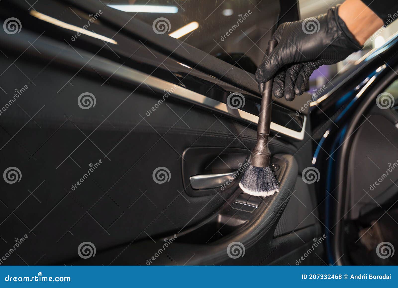 Detailing Master Cleans the Car Door Card with Brush. Stock Photo