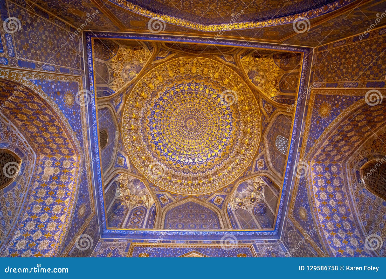 blue interior with gold gild of tile karl madrasa in the registan, samarkand, uzbekistan