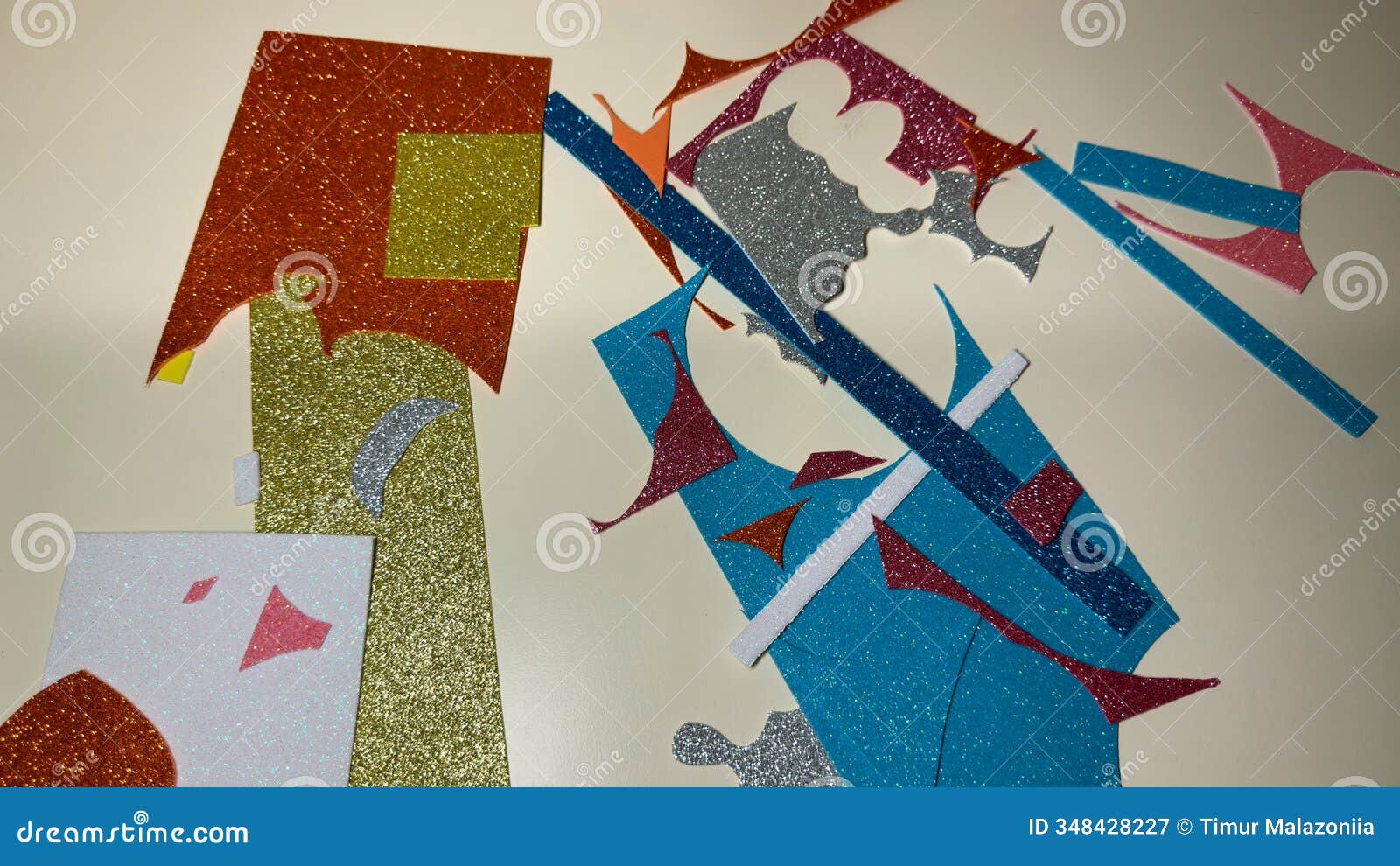 details of cut foamiran of different colors in sparkles on table