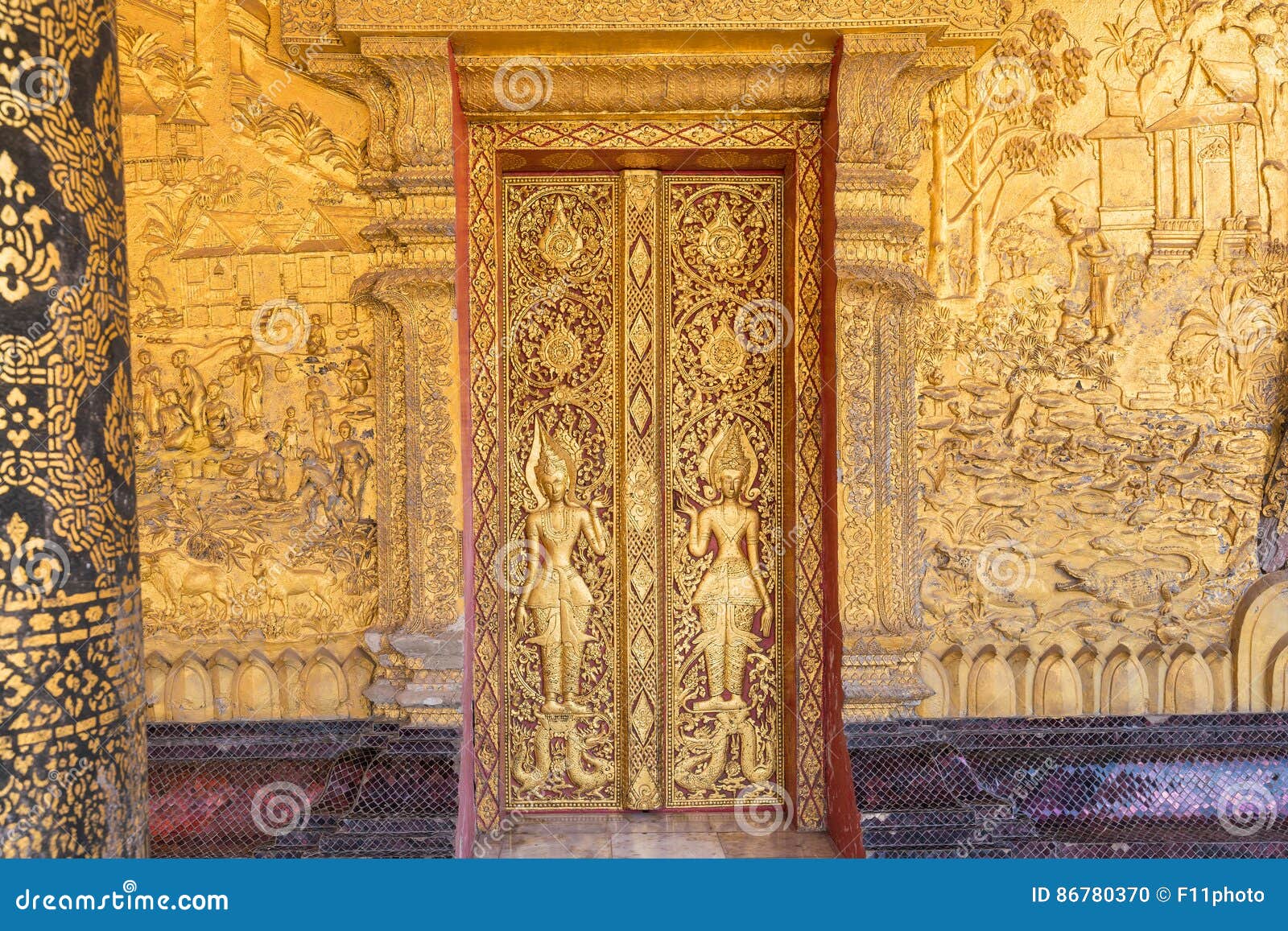 details shot of laos`s art at wat mai in luang pra bang