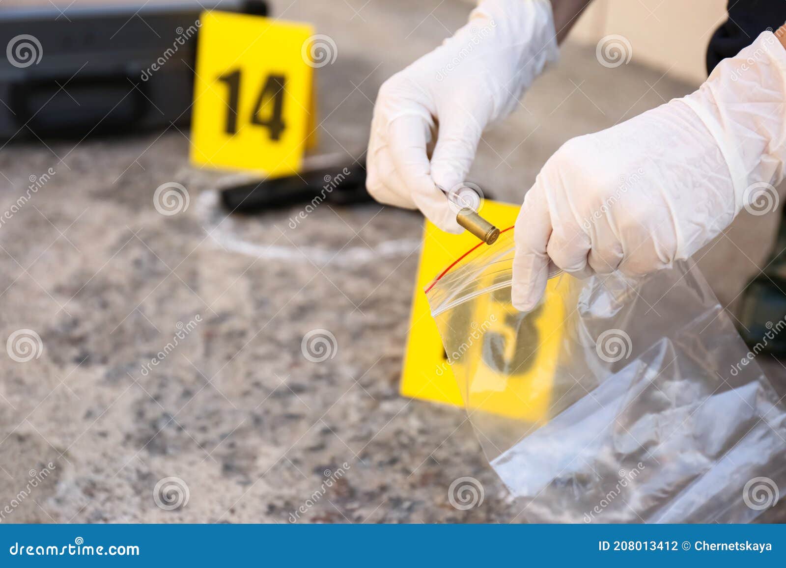 detective collecting evidences at crime scene, closeup