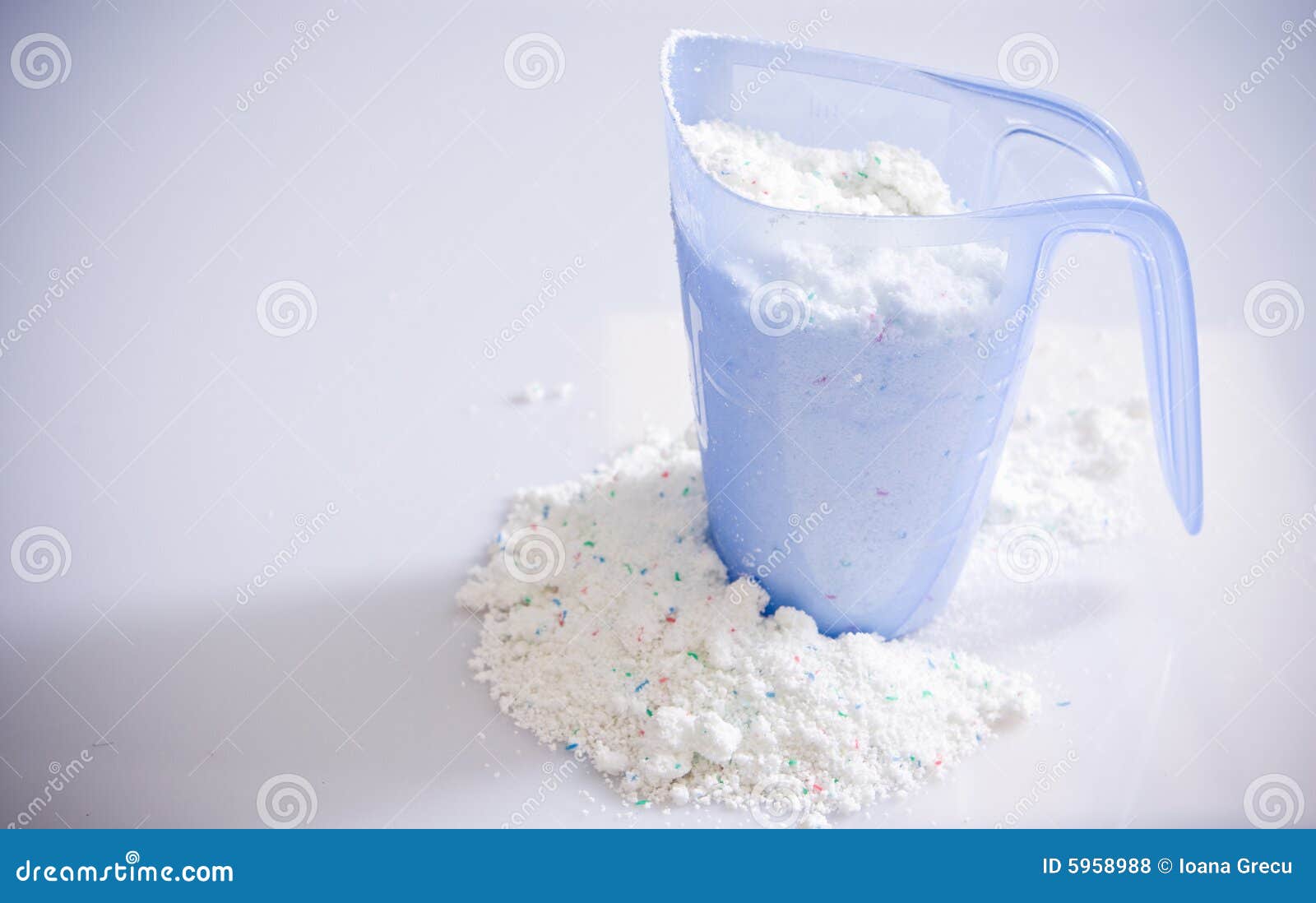 Laundry Detergent Or Washing Powder In Blue Measuring Cup Stock Photo -  Download Image Now - iStock