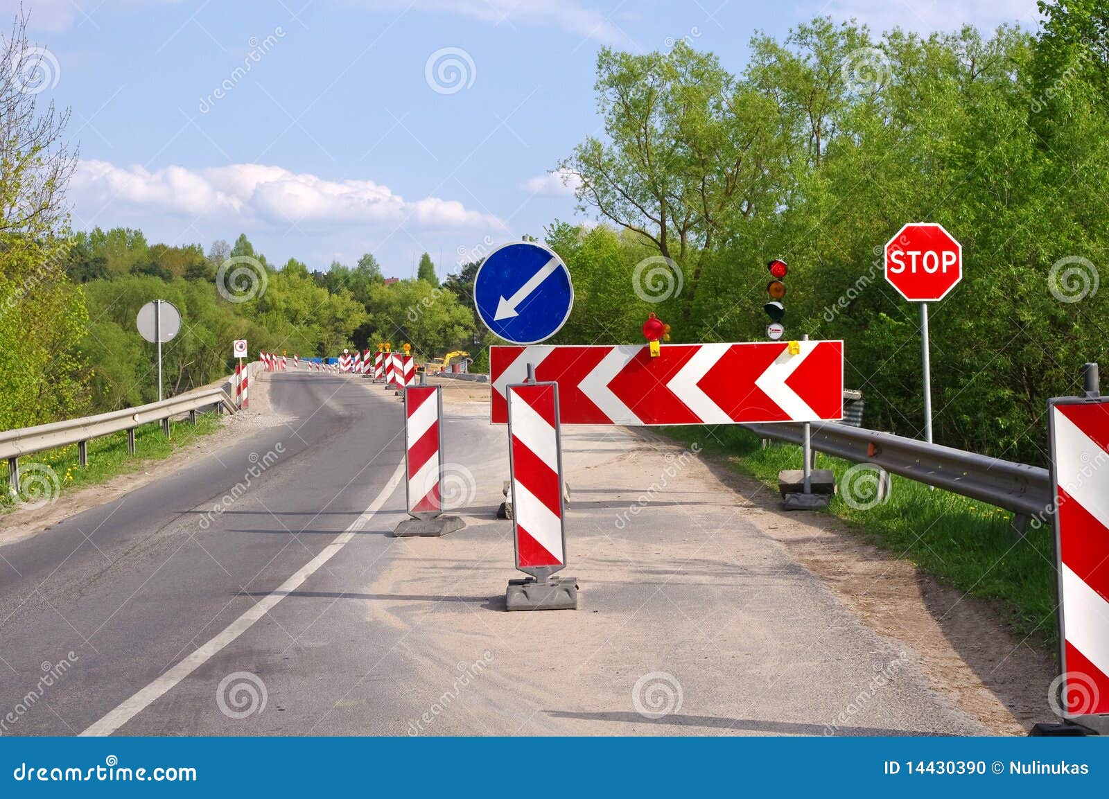 detour and road construction signs