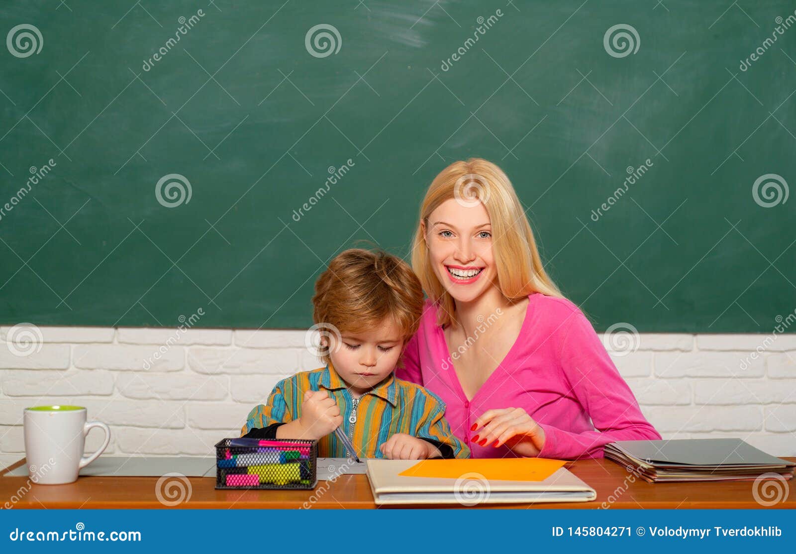 Developing and upbringing. School kindergarten and development. Developing talents and skills. Child care and developing. Preschool preparation. Kid little boy and teacher woman pedagogue classroom.