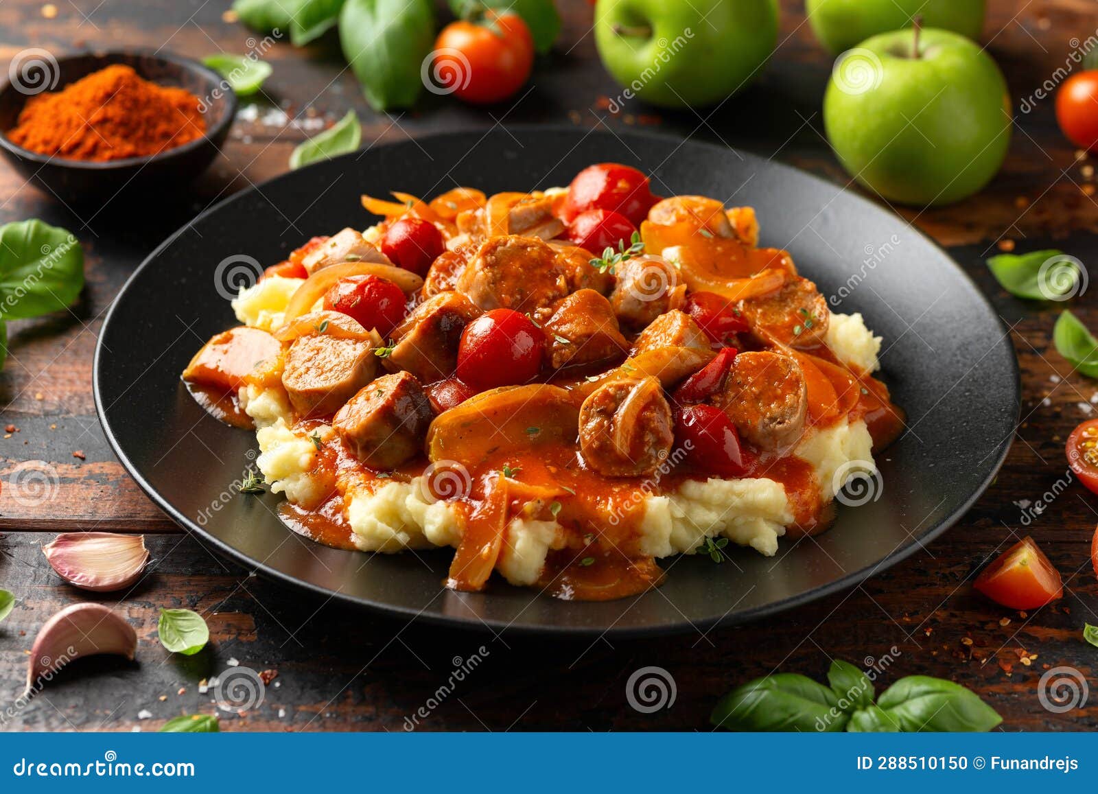 Devilled Sausages with Mashed Potato, Spiced Tomato and Apple Sauce