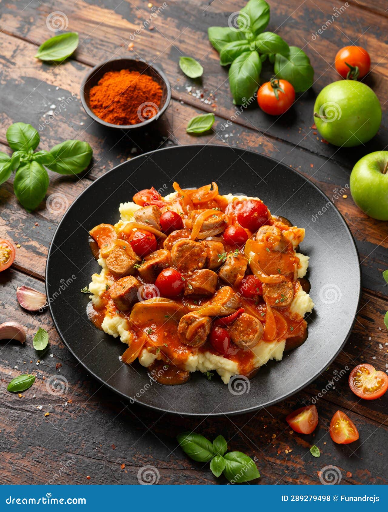 Devilled Sausages with Mashed Potato, Spiced Tomato and Apple Sauce