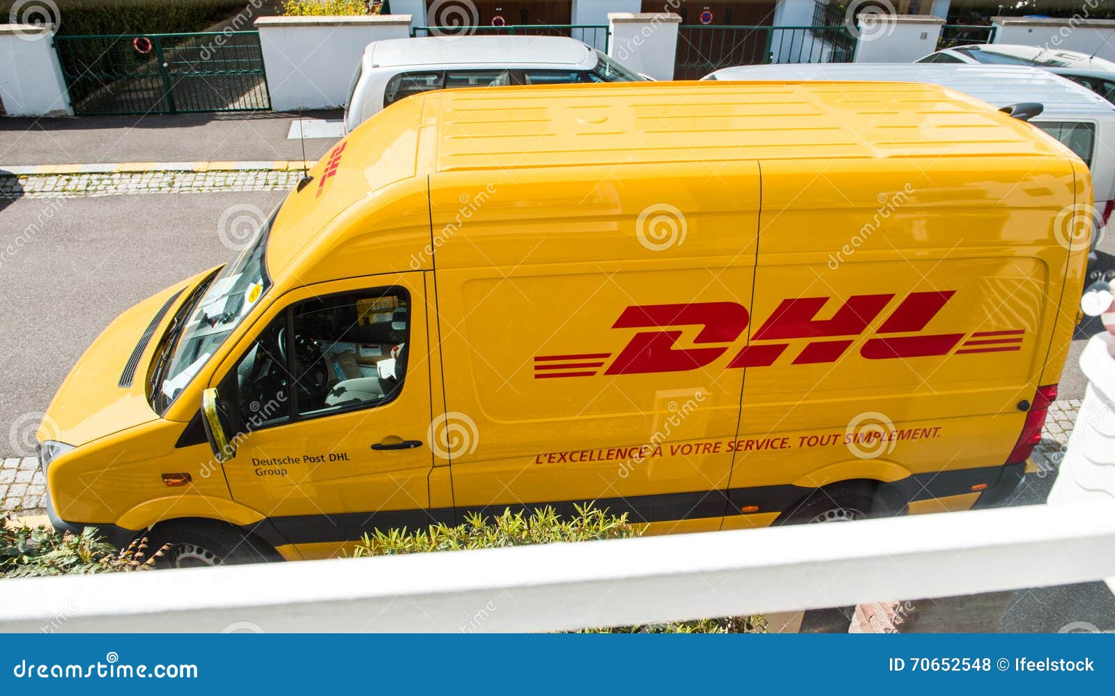 DHL Delivery yellow van editorial stock photo. Image of adult - 70652548