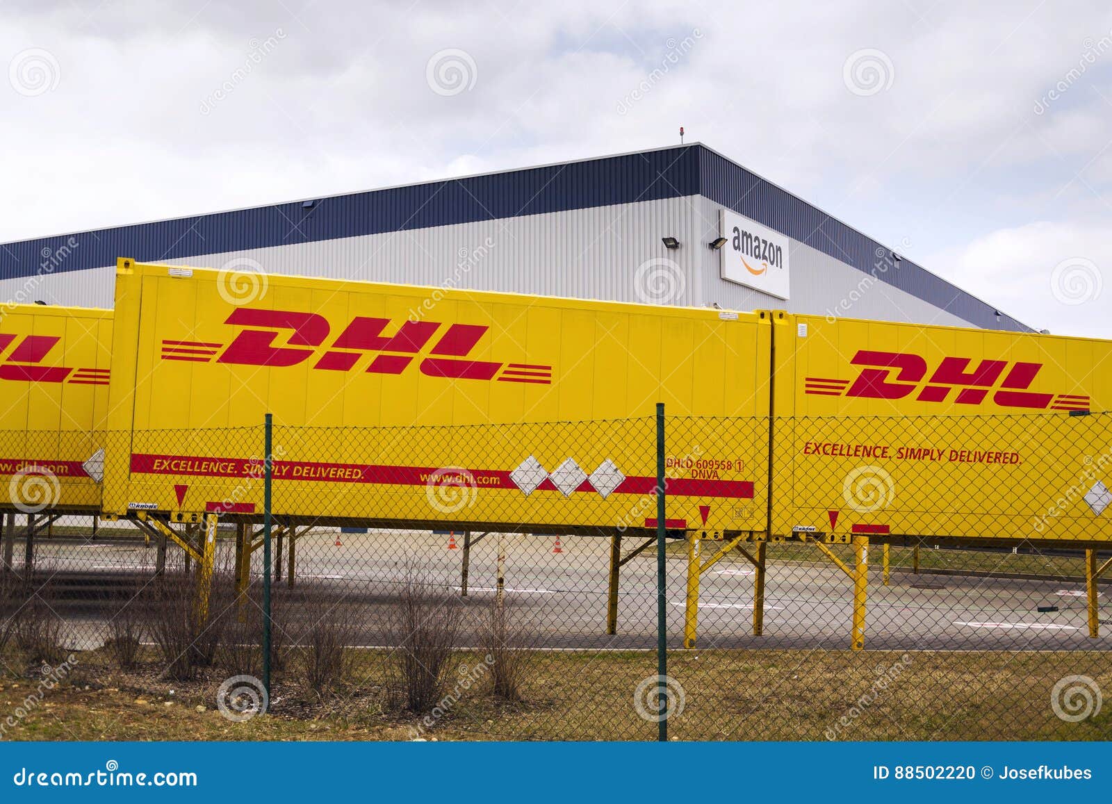 DHL Shipping Containers in Front of Amazon Logistics Building on March ...