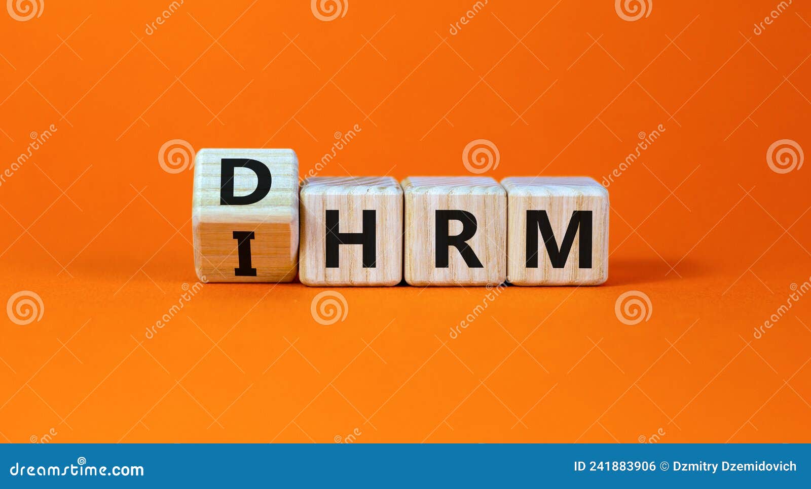 dhrm, domestic or international human resource management ihrm . words dhrm, ihrm on cubes on a beautiful orange background