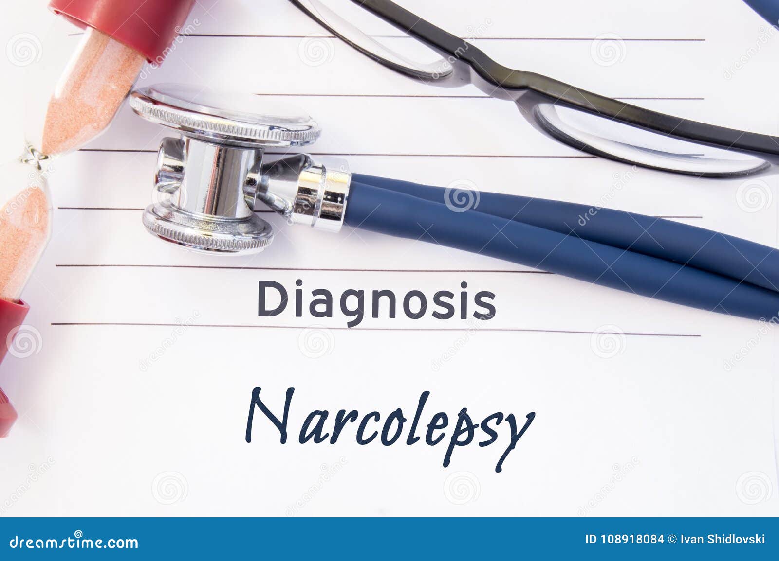 diagnosis narcolepsy. psychiatric diagnosis narcolepsy is written on paper, on which lay stethoscope and hourglass for measuring t
