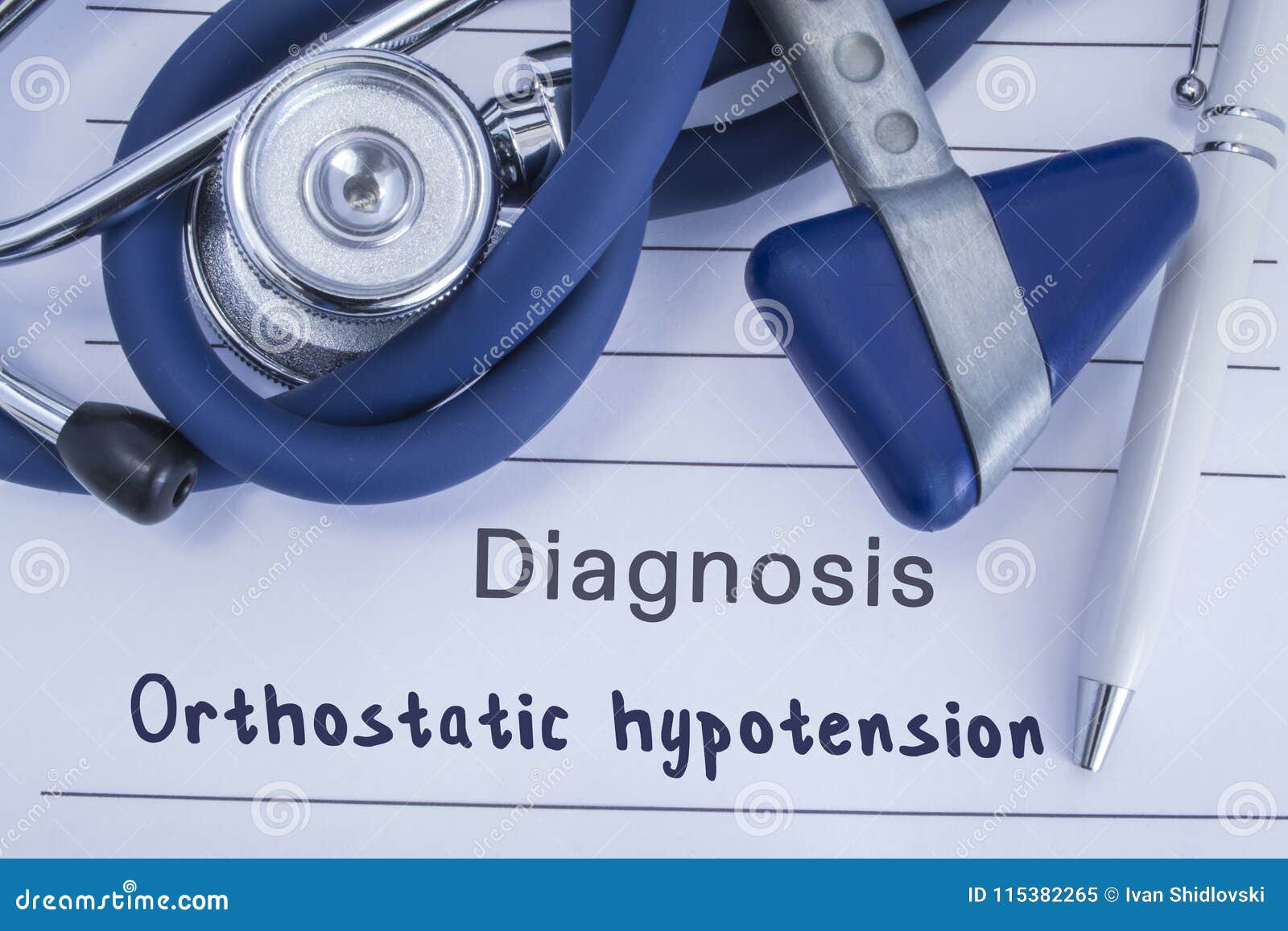the diagnosis of orthostatic hypotension. paper medical history with diagnosis of orthostatic hypotension, on which lie blue steth