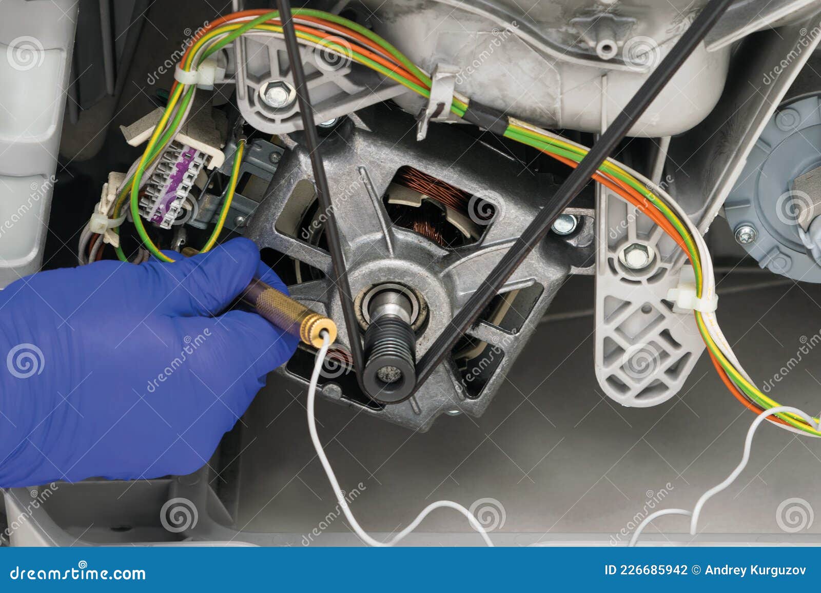 Repair Of Electric Scooters. In The Hands Of The Master, A Wheel From A