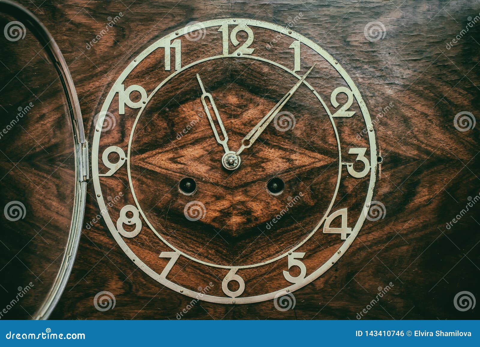 Dial of old wooden clock stock photo. Image of wooden 143410746
