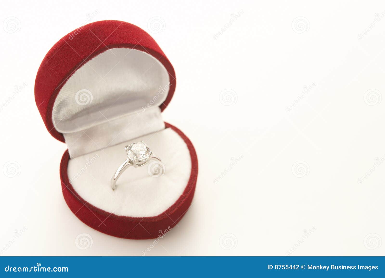 Diamond Engagement Ring In Unfolding Pink Rose Stock Photo