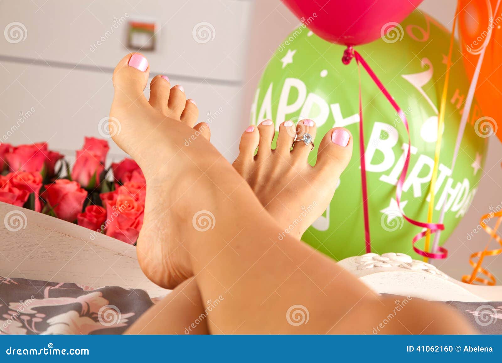 diamond-ring-aquamarine-women-feet-woman-bed-present-finger-happy-birthday-morning-41062160.jpg