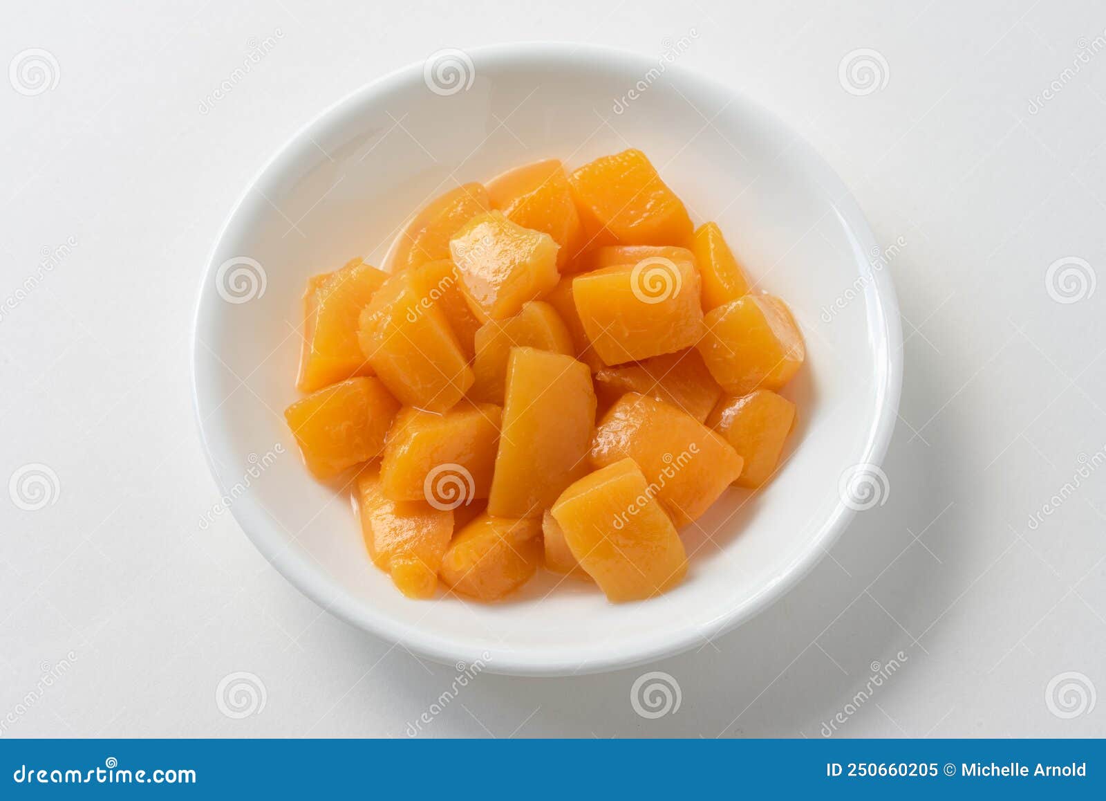 Diced Peaches in a Bowl stock image. Image of macro 250660205