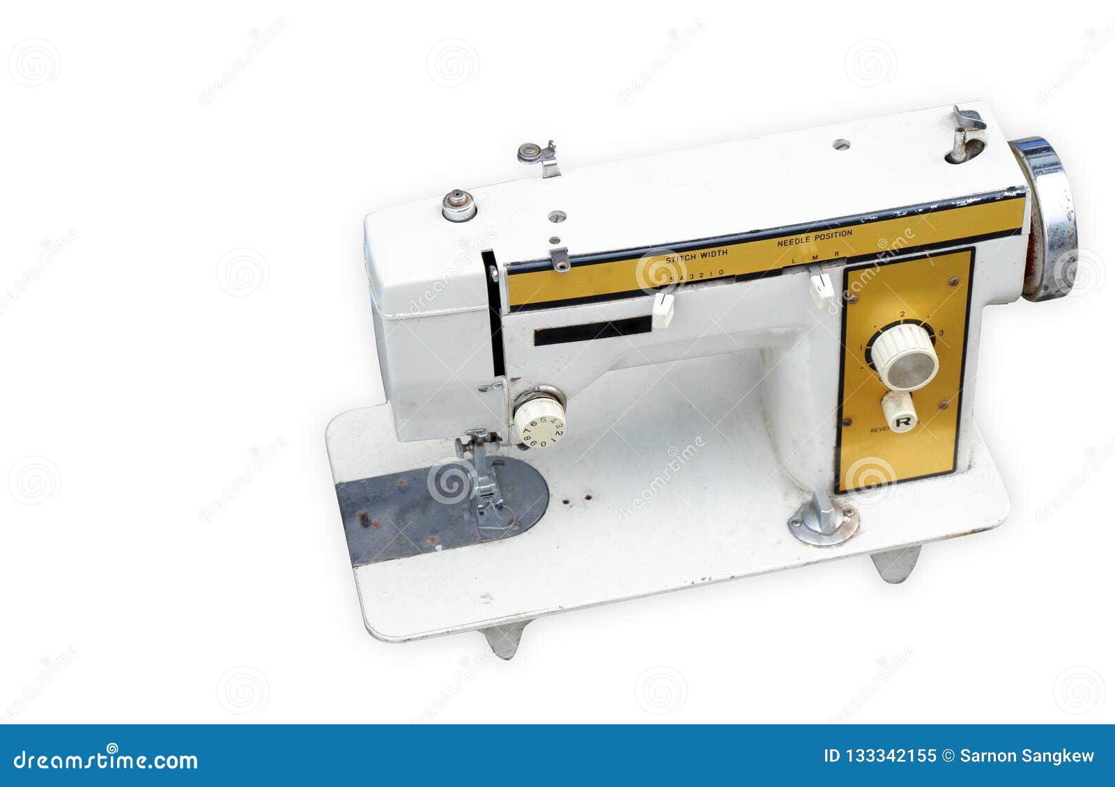 Dicut White and Yellow Ancient Sewing Machine on White Backgrou Stock