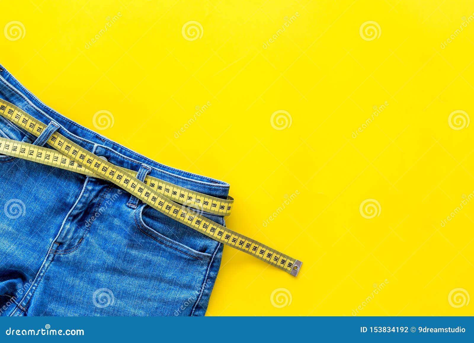 Download Weight Loss Concept With Jeans And Measuring Tape On Yellow Background Top View Mockup Stock Photo Image Of Copyspace Loss 153834192