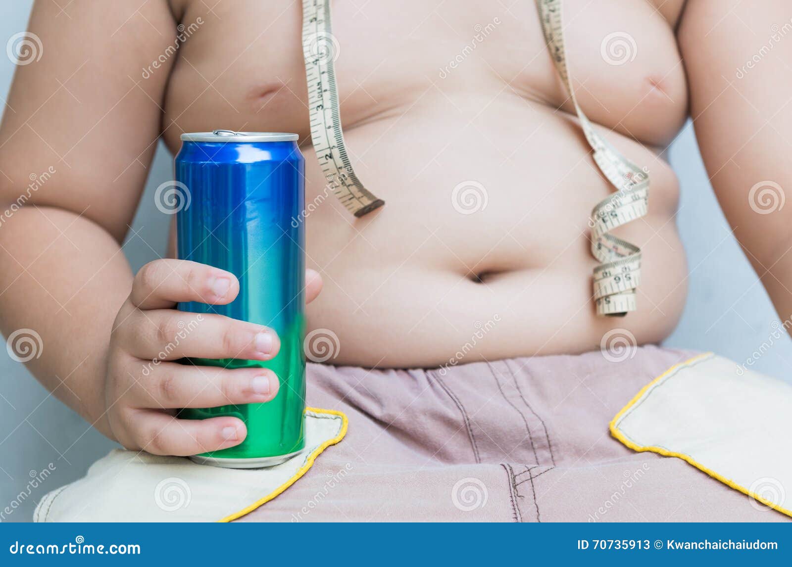 Diet. Obese Fat Boy Holding Soft Drink Can. Stock Image - Image of