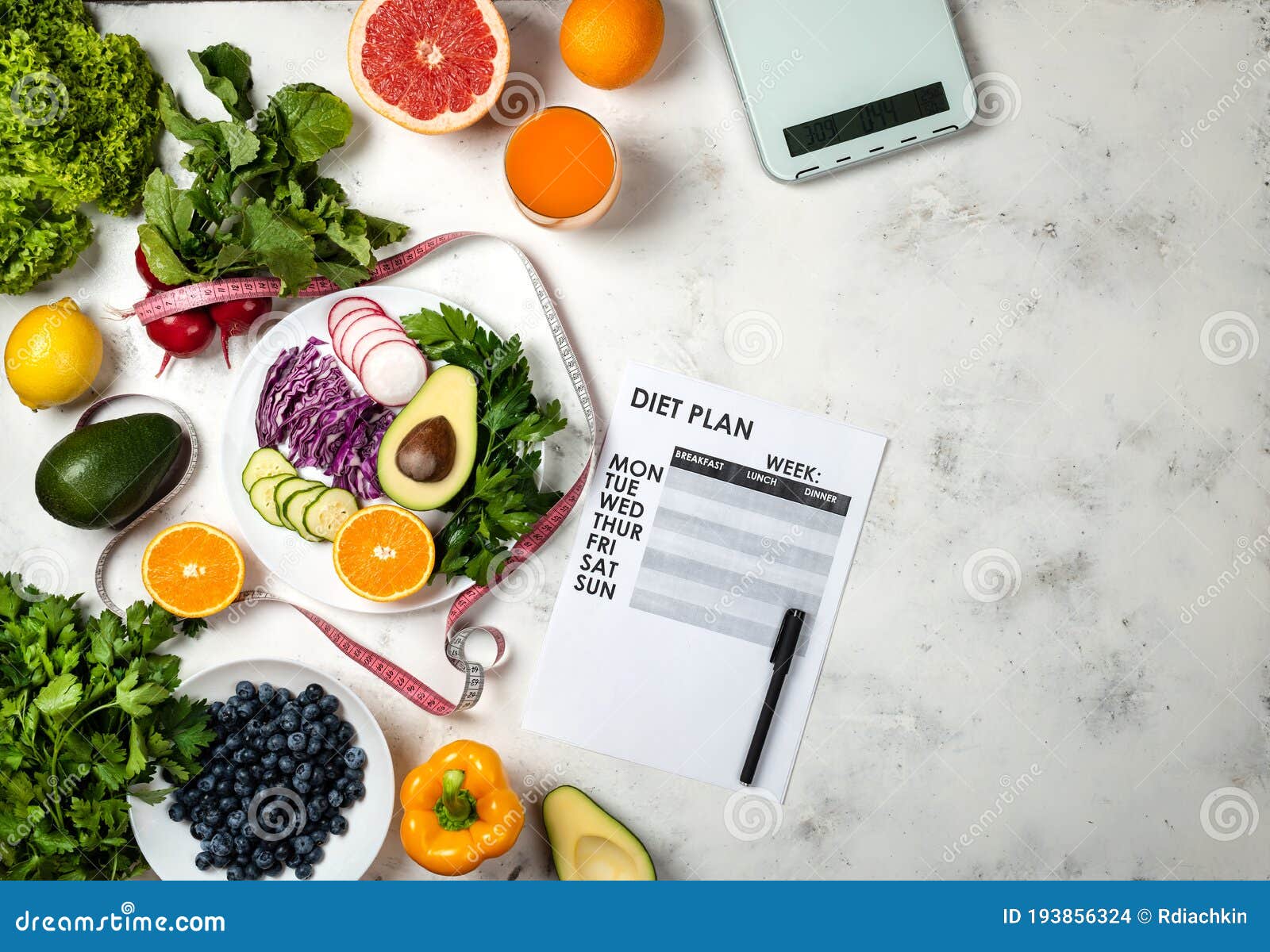 Diet Plan and Set of Fruits and Vegetables on the Table. Top View Stock