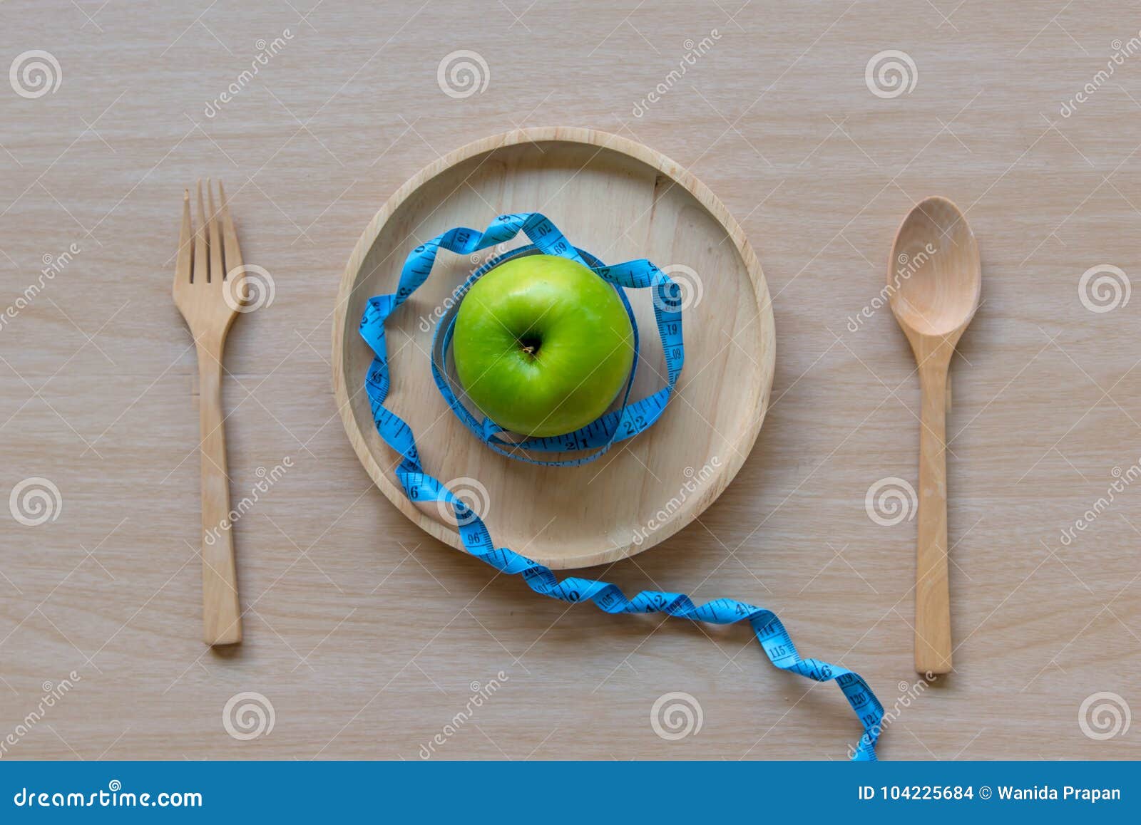 Diet Slimming Weight with Green Apple and Measuring Tap on the Wood ...