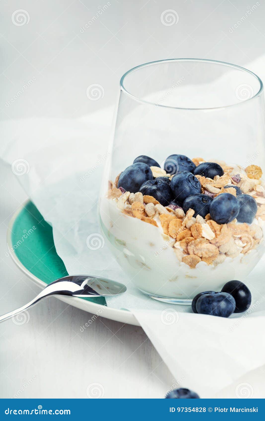 Dietetic Breakfast Yoghurt with Muesli and Huckleberries Stock Photo