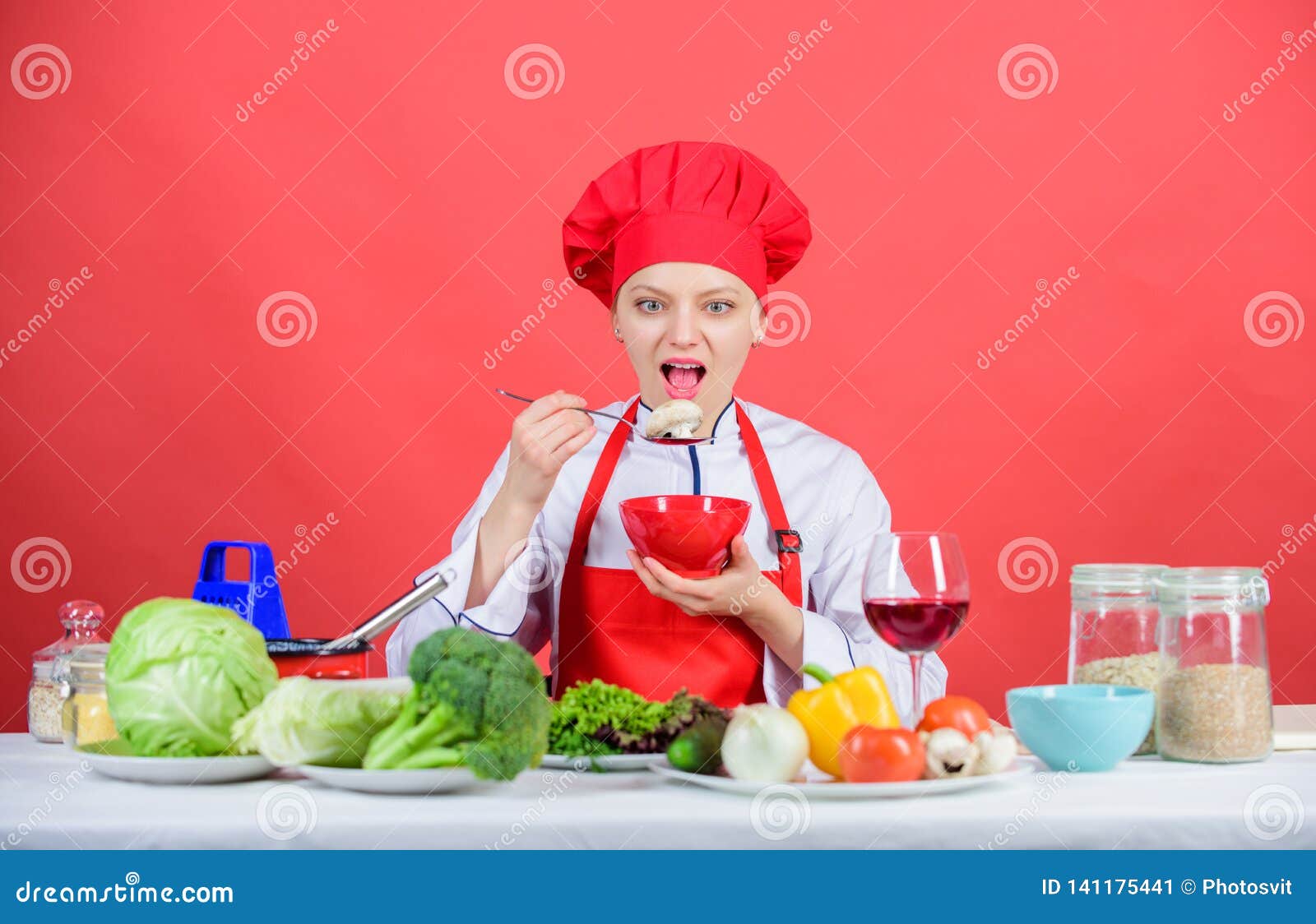 Dieting Concept. Eat Healthy. Girl Wear Hat and Apron Try Meal Taste ...