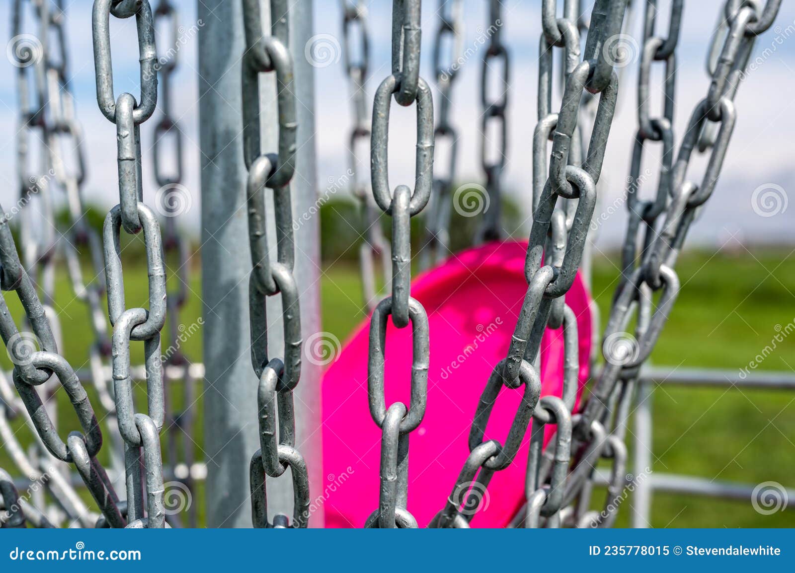 Different Angles of View of a Disc Golf Basket and Chains Stock Image