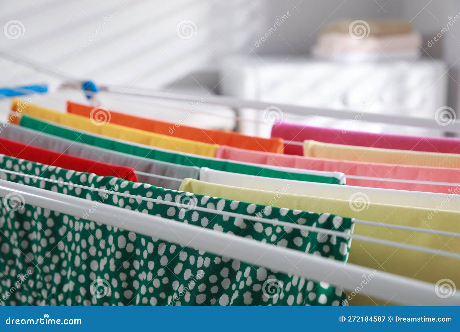 Different Apparel Drying on Clothes Airer Indoors, Closeup Stock Image